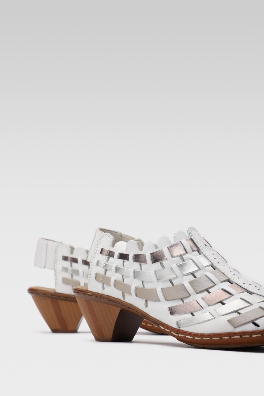 
                Rieker - Skórzane sandały na obcasie - 5903698626796