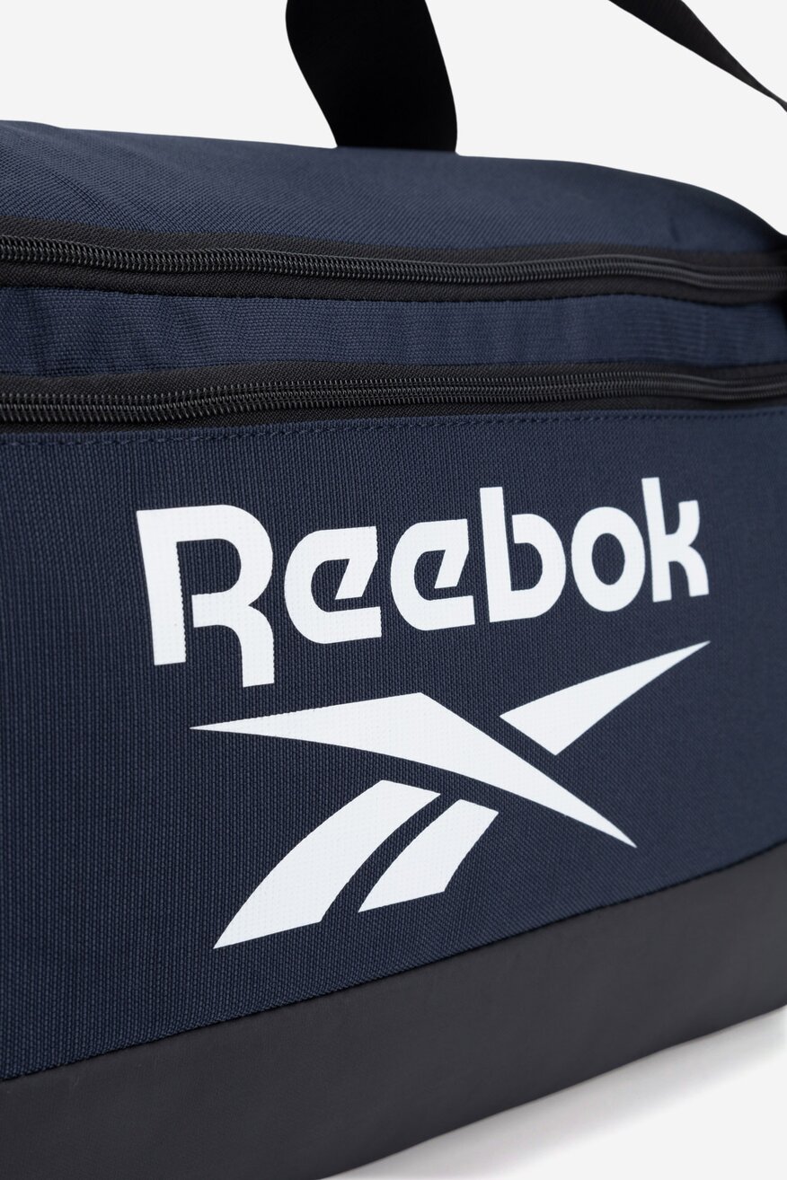 Cestovní taška Reebok TMAVĚ MODRÁ - 5906751225554
