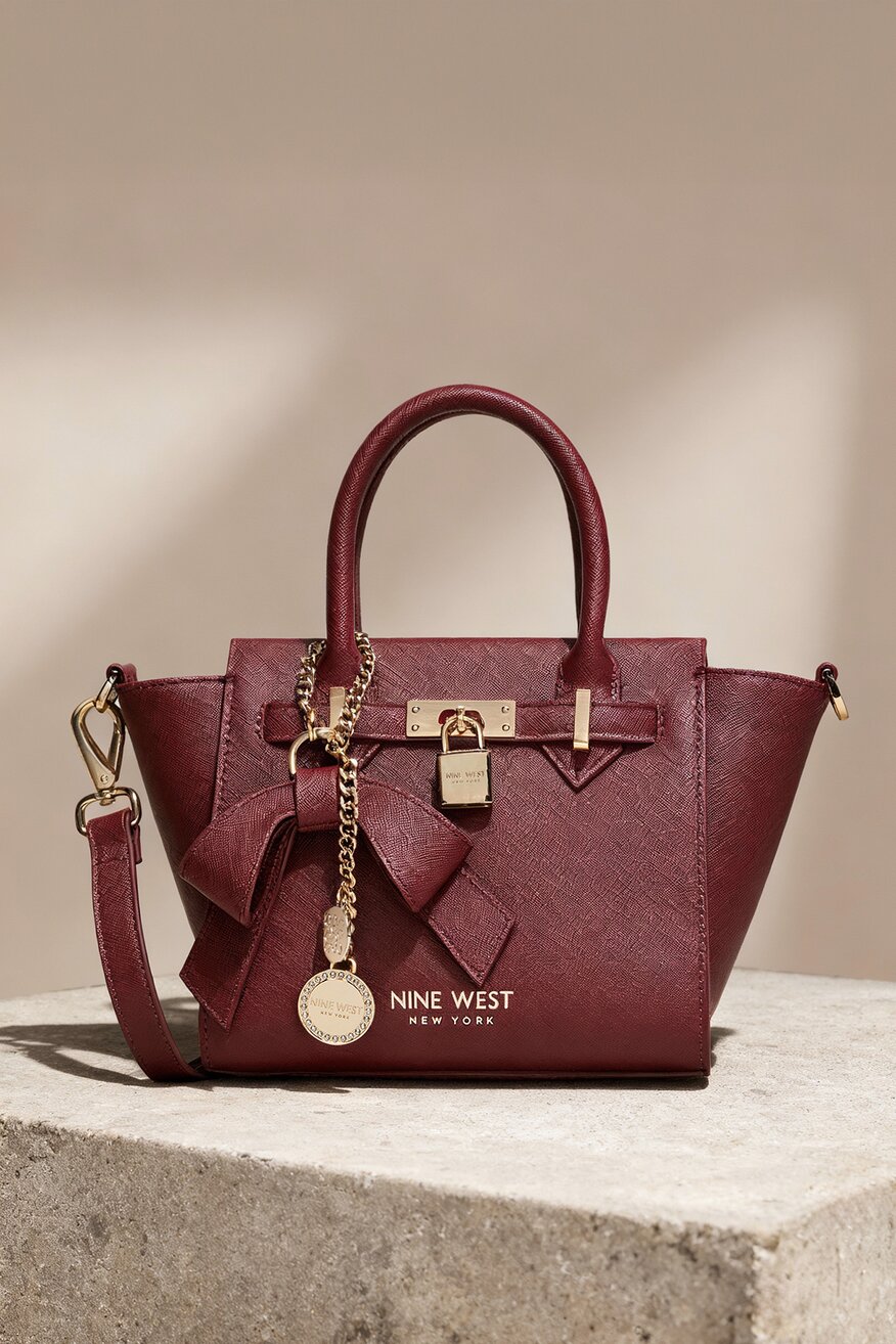 
                Сумка З Ремінцем NINE WEST БОРДОВИЙ - 5907964154761