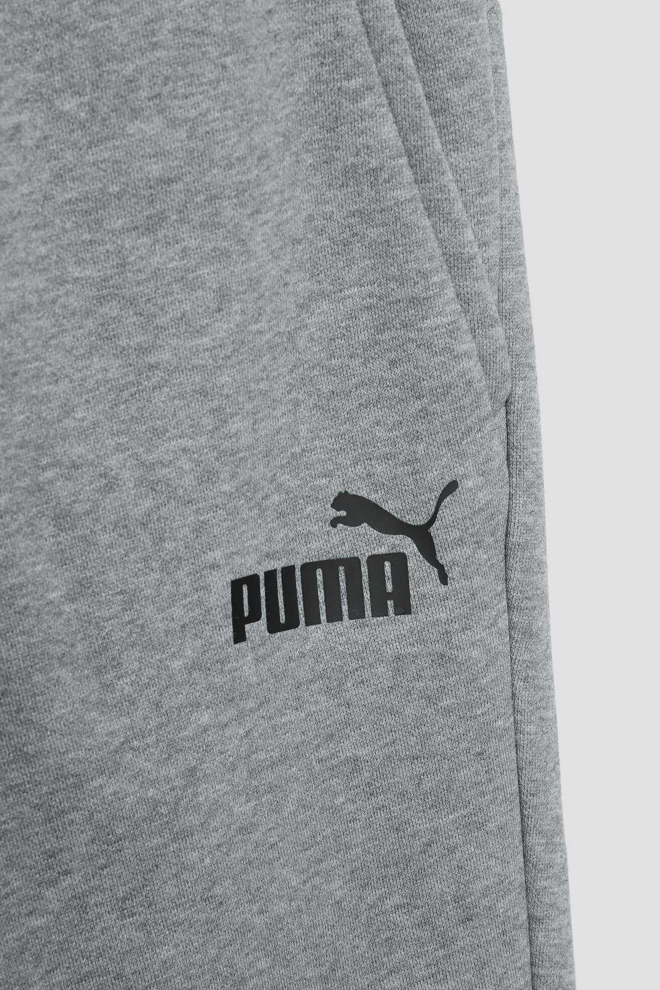 Spodnie joggersy Puma ESS LOGO PANTS FL Szary