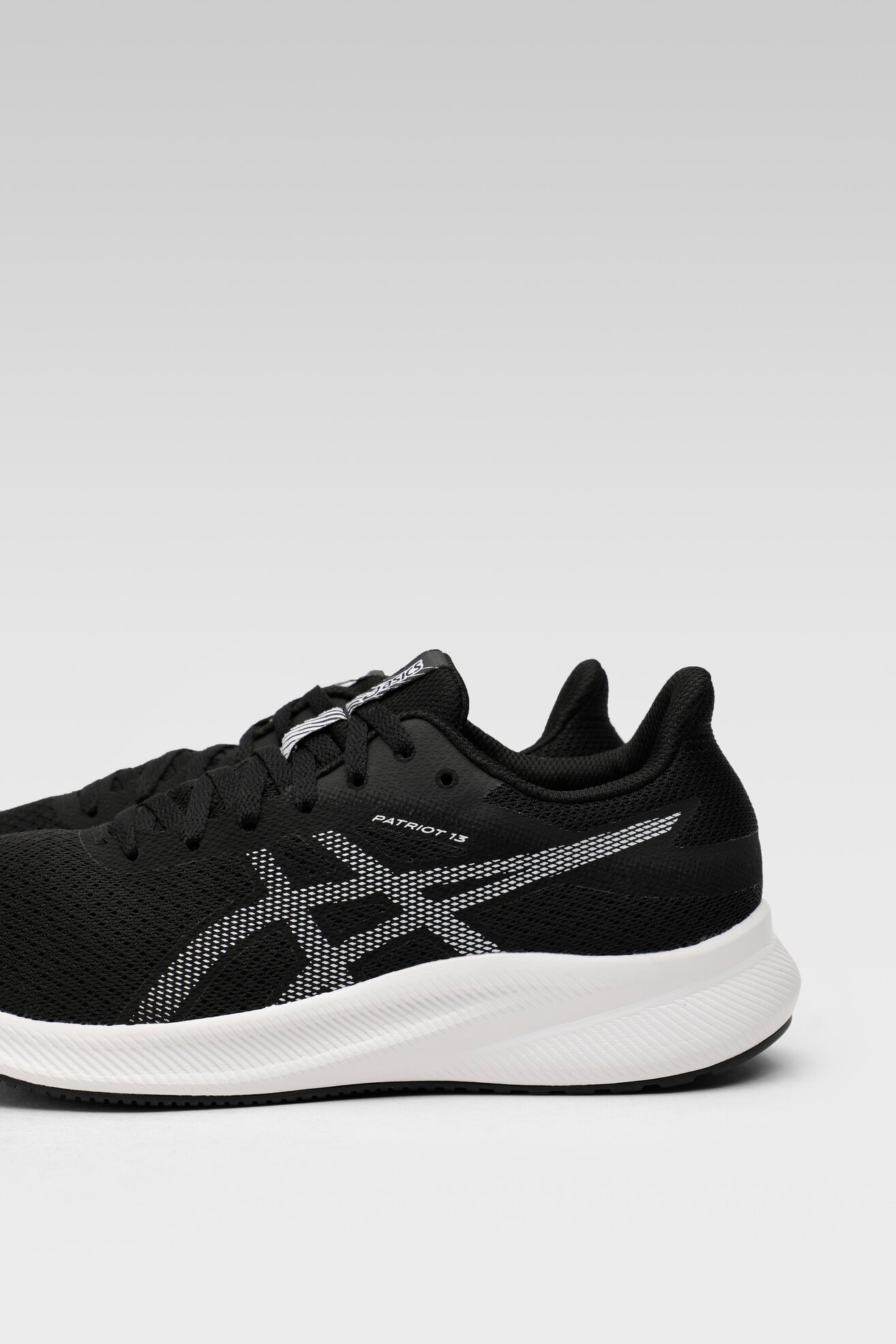 Obuwie sportowe ASICS PATRIOT 13 1011B485-001 Czarny