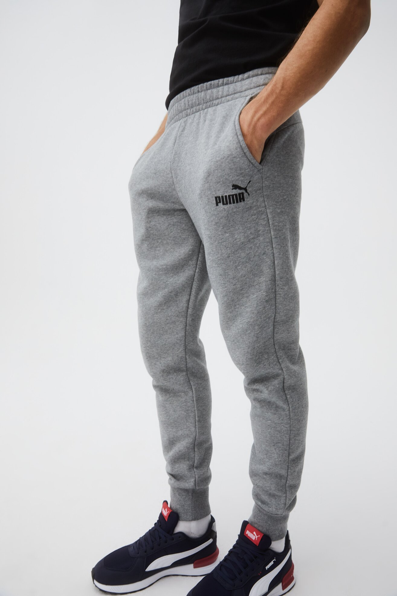 Spodnie joggersy Puma ESS LOGO PANTS FL Szary