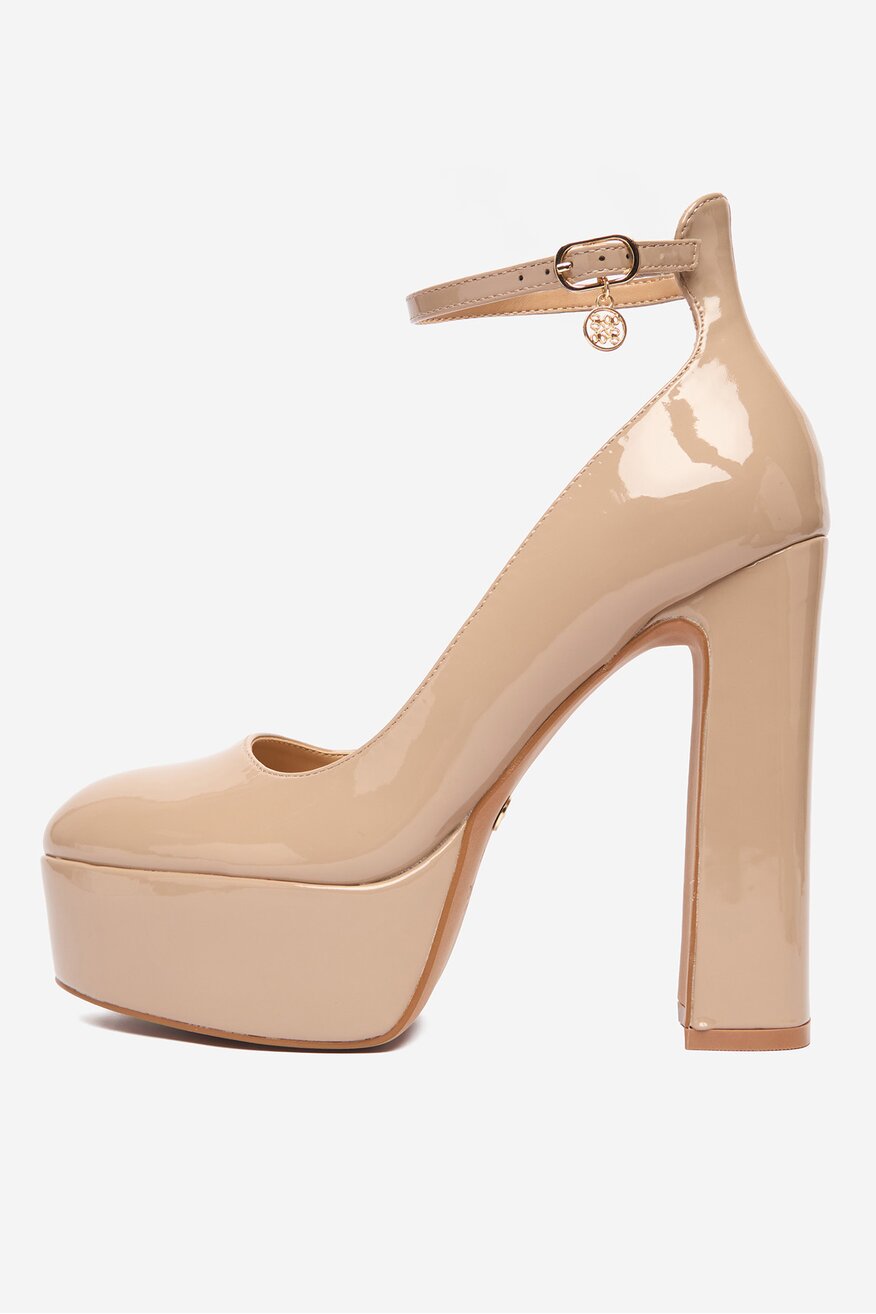 
                NINE WEST - Czółenka na słupku - 5906751849705