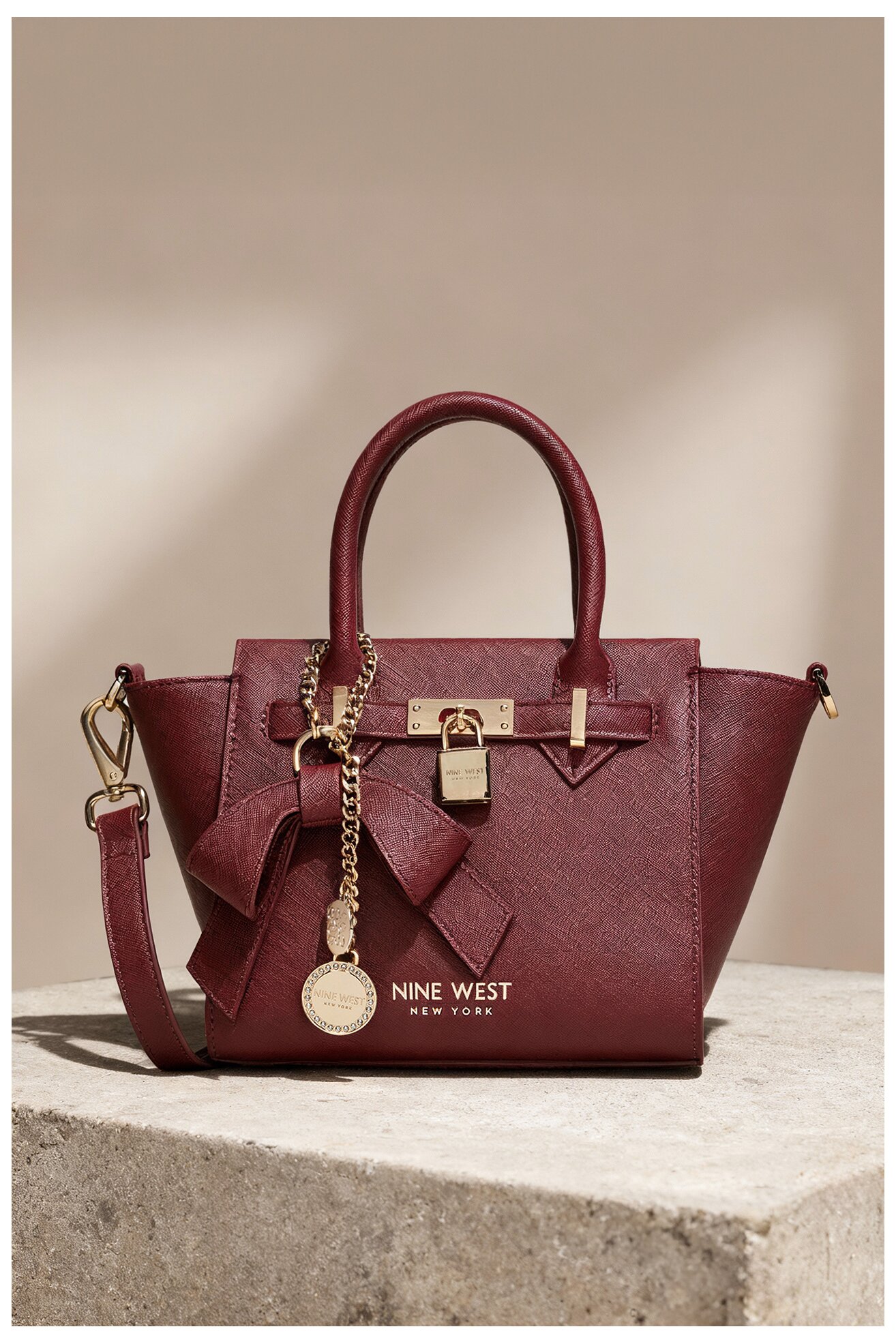 Geantă de mână NINE WEST CEO-CHELSEA-CHARM-I-LX10187 GRENA