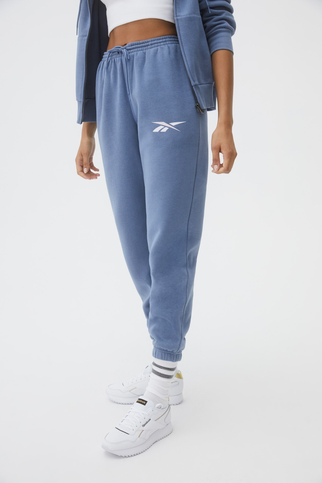 Spodnie joggersy Reebok TE VECTOR FLEECE PANTS Niebieski