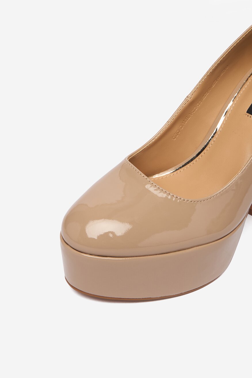 
                NINE WEST - Czółenka na słupku - 5906751849705