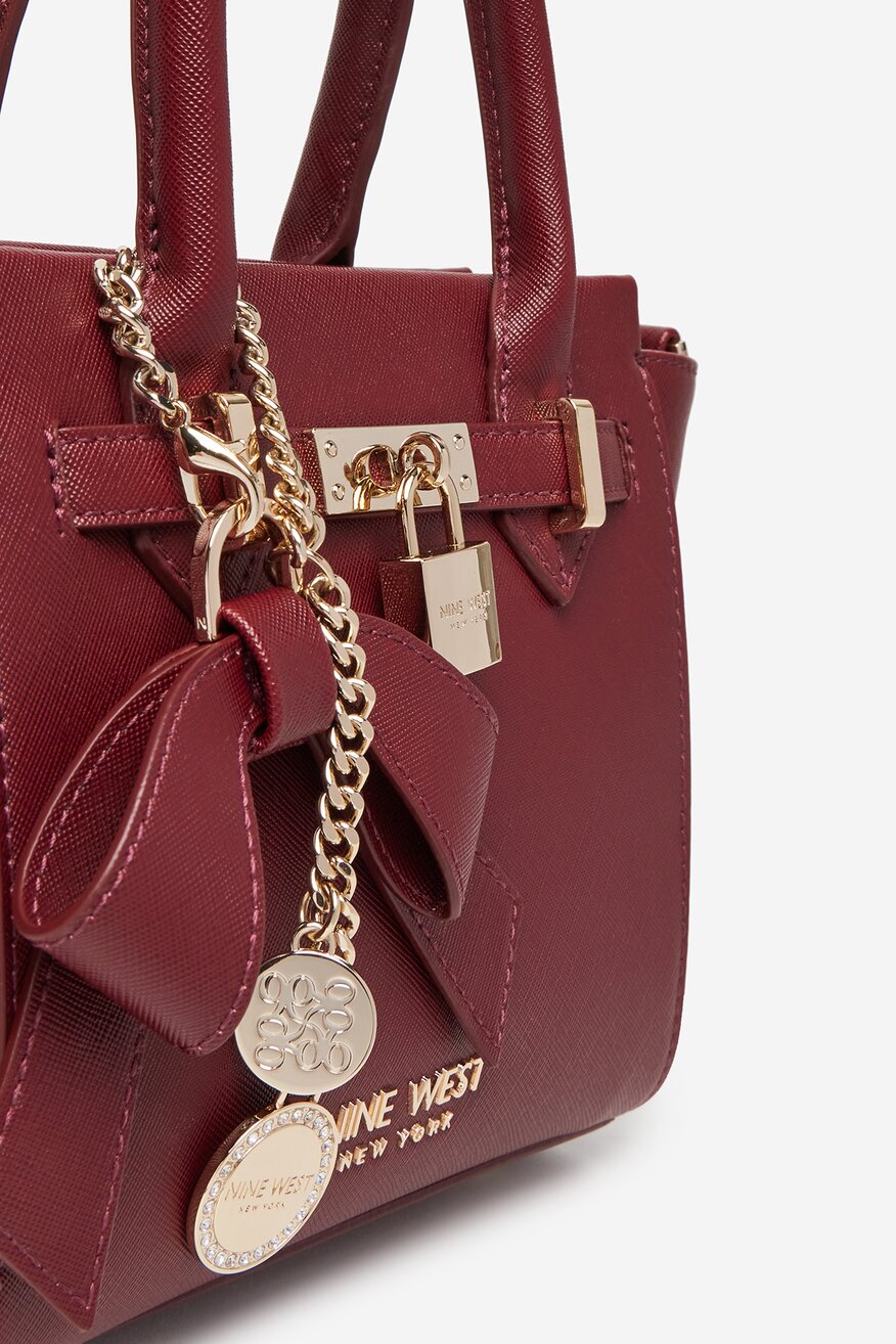 
                Сумка З Ремінцем NINE WEST БОРДОВИЙ - 5907964154761