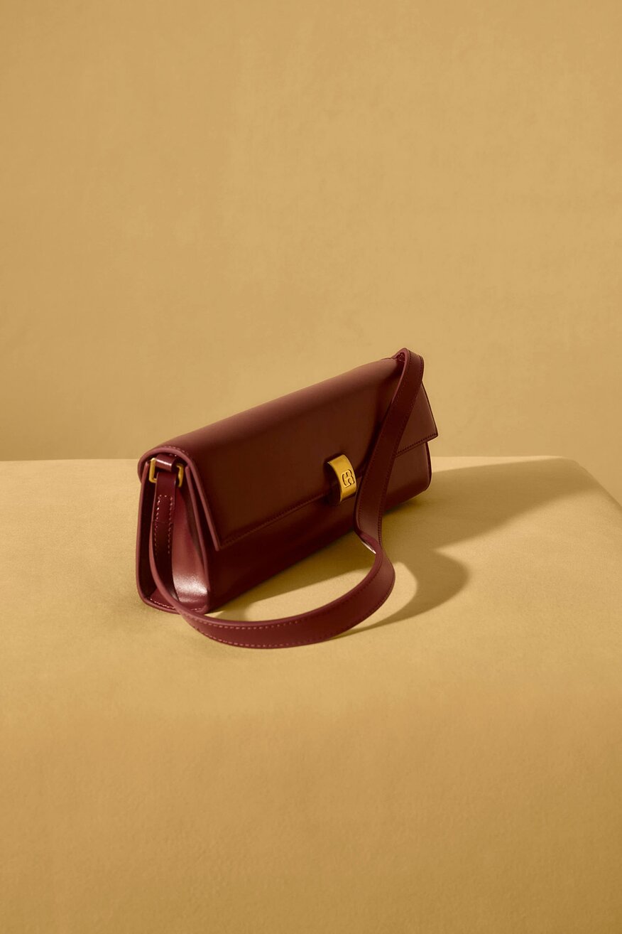 
                Сумка З Ремінцем Gino Rossi БОРДОВИЙ - 5903419782961