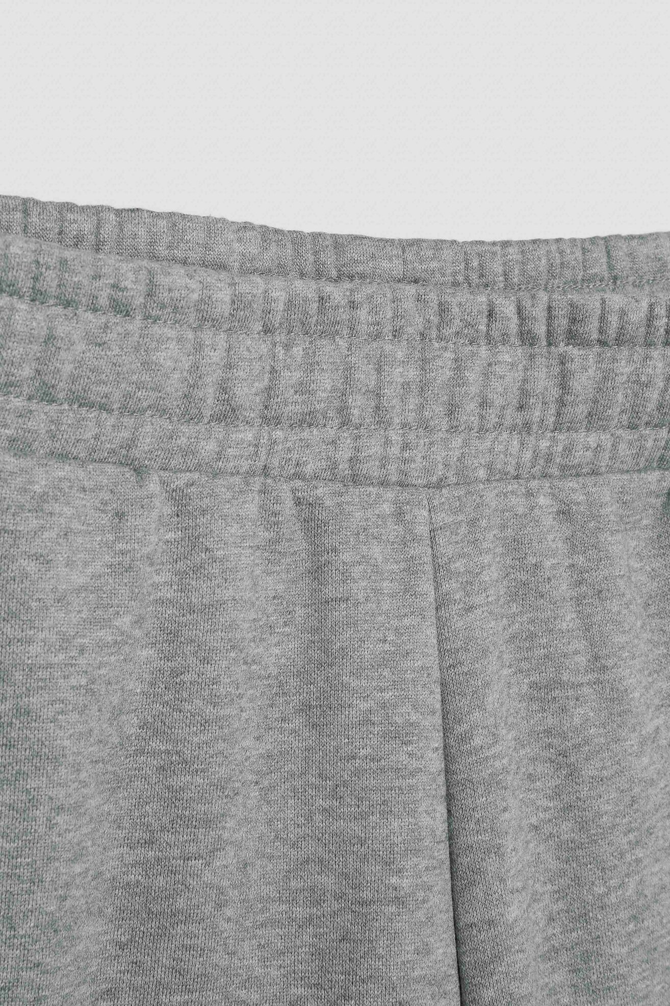 Spodnie joggersy Puma ESS LOGO PANTS FL Szary