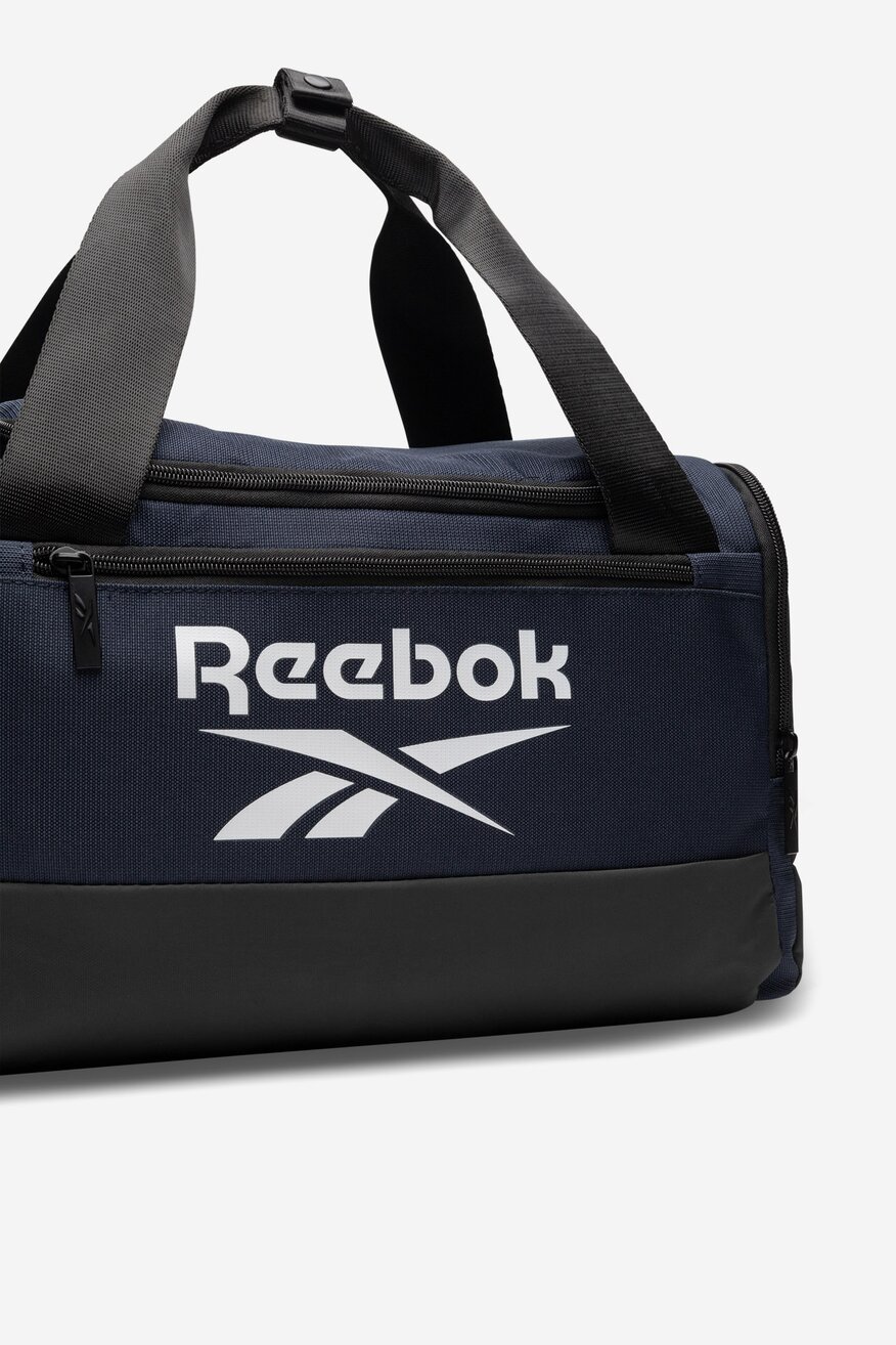 Cestovní taška Reebok TMAVĚ MODRÁ - 5906751225196