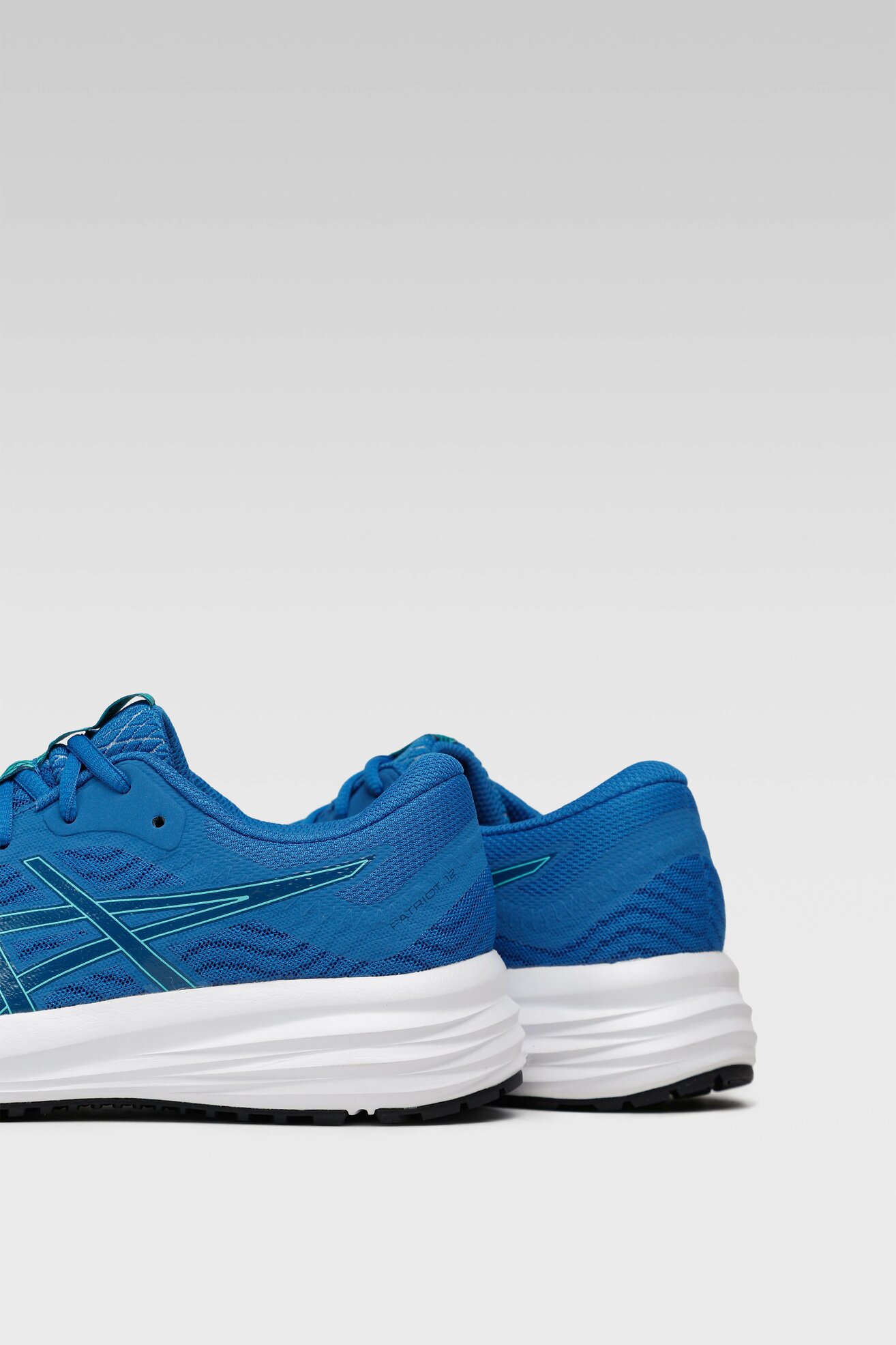 Obuwie sportowe ASICS PATRIOT 1011A823-417 Niebieski