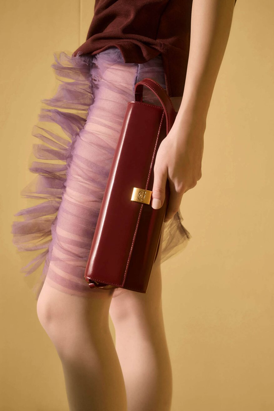 
                Сумка З Ремінцем Gino Rossi БОРДОВИЙ - 5903419782961