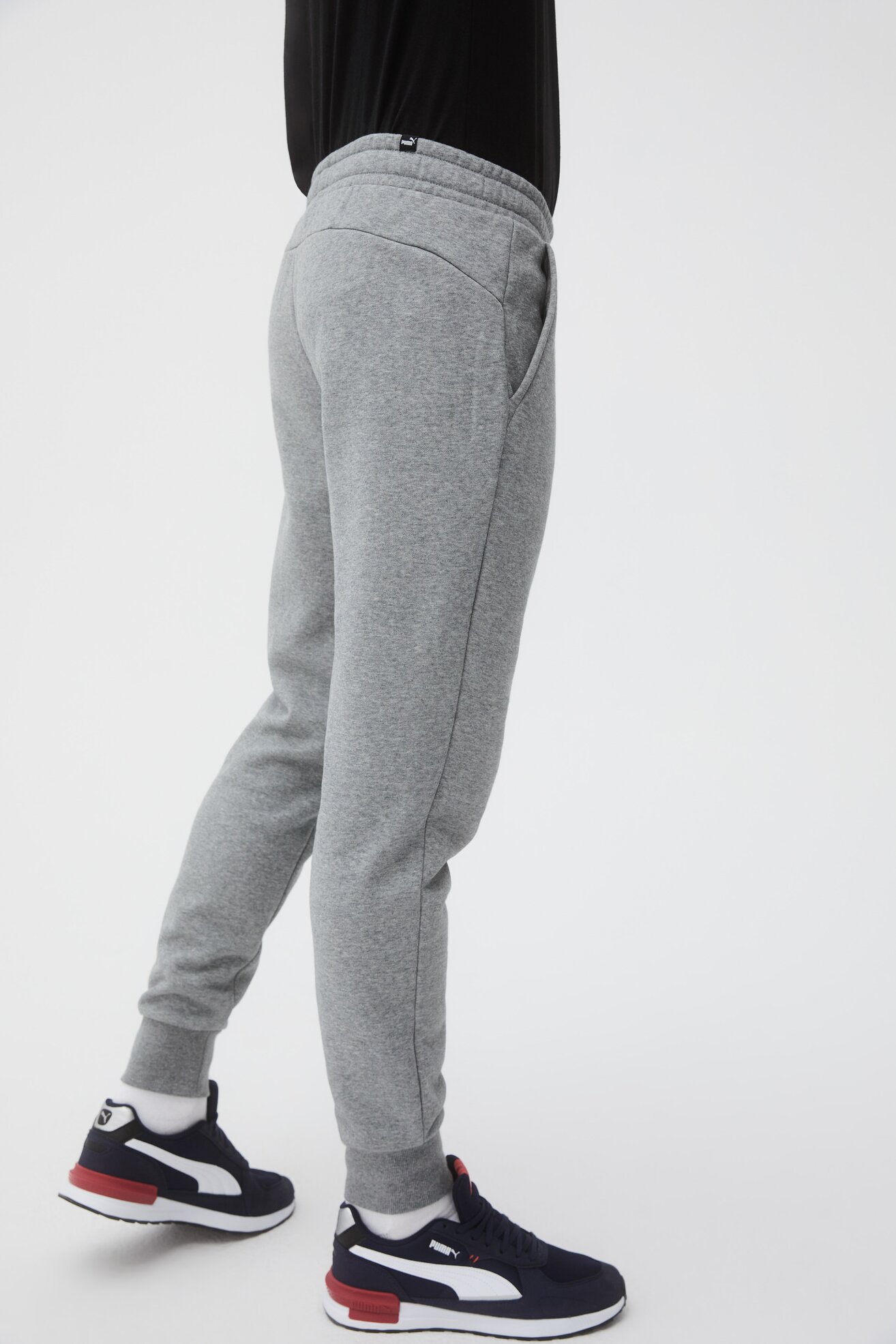 Spodnie joggersy Puma ESS LOGO PANTS FL Szary