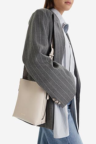 Kézitáska Gino Rossi EO-LX9952 CSONTSZÍNŰ