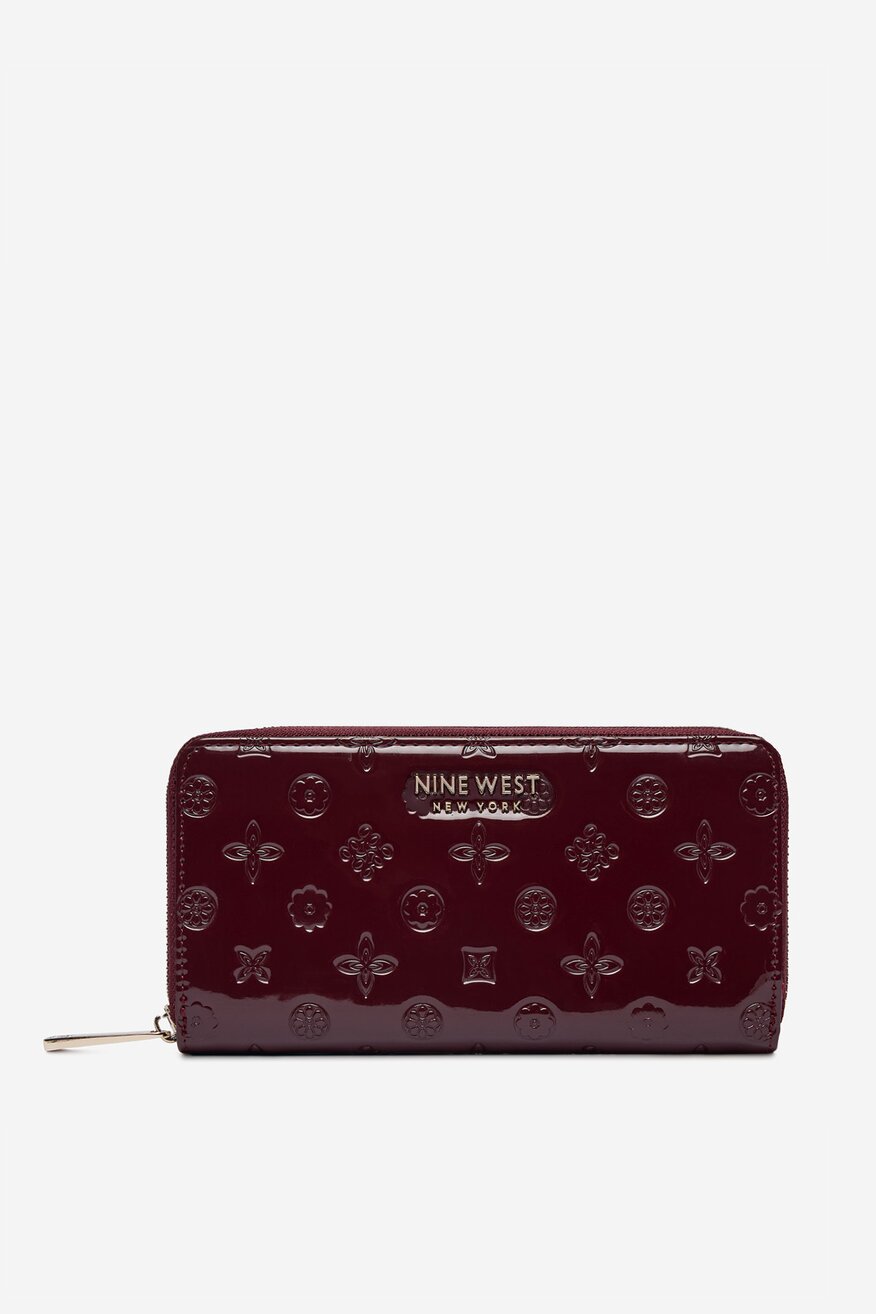 
                Гаманець Жіночий NINE WEST СВІТЛО-БОРДОВИЙ - 5907964466116