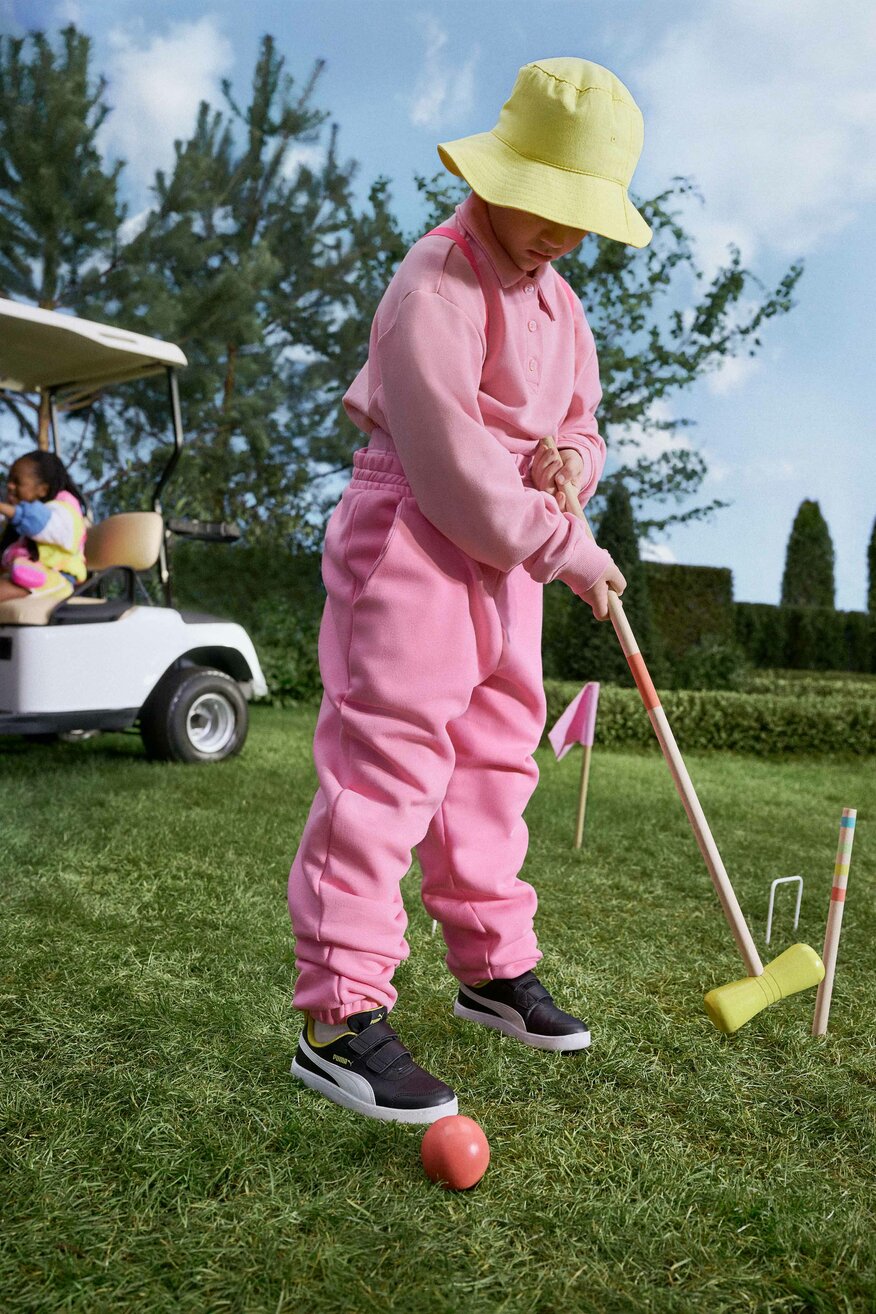 Dziecięce buty sportowe Puma - czarne z białymi i żółtymi wstawkami