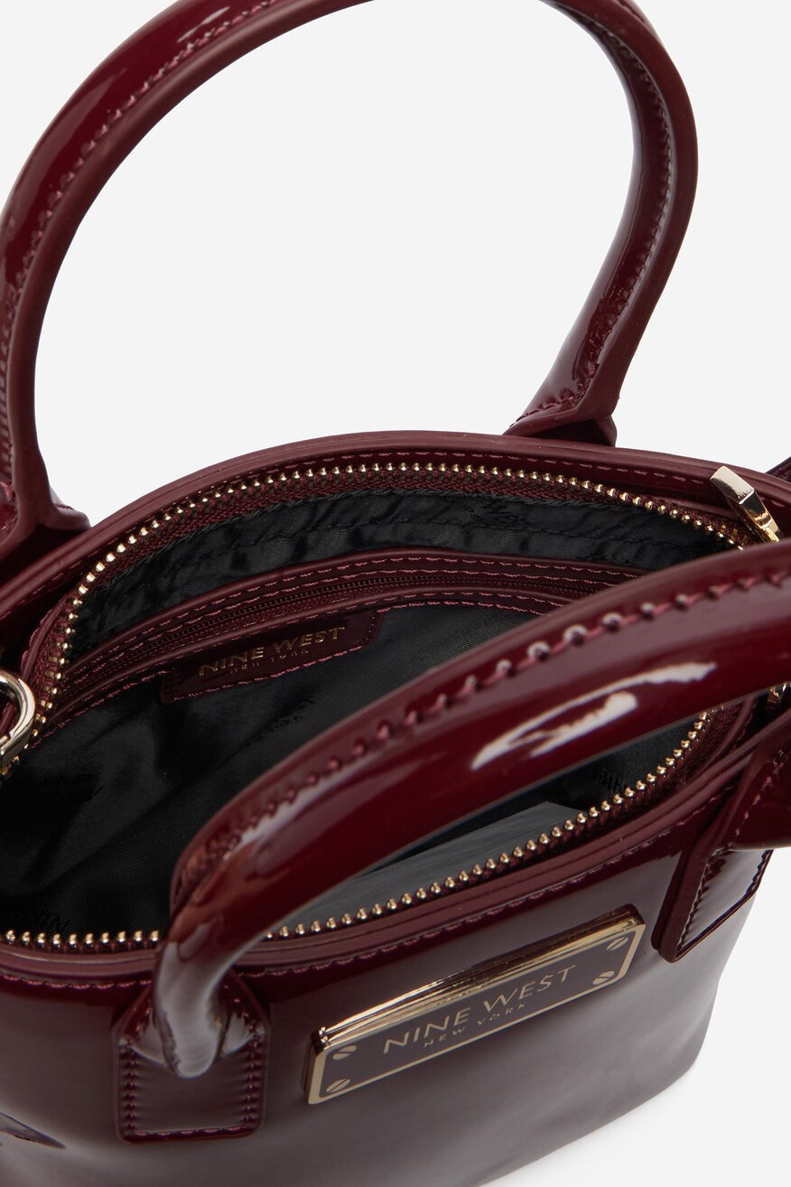 
                Сумка З Ремінцем NINE WEST СВІТЛО-БОРДОВИЙ - 5907964114505