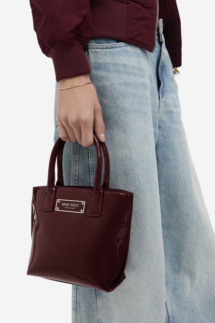 
                Сумка З Ремінцем NINE WEST СВІТЛО-БОРДОВИЙ - 5907964114505