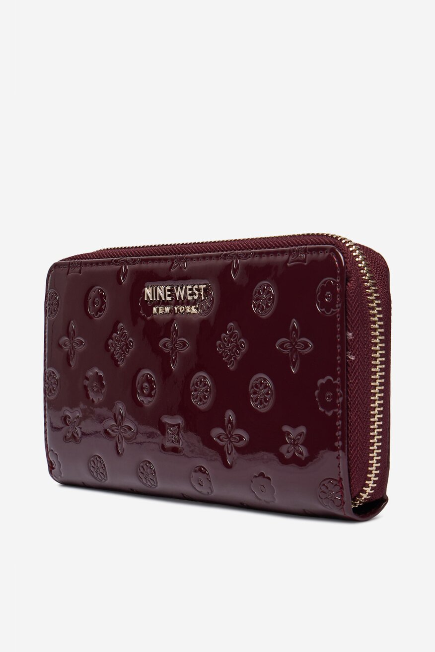 
                Гаманець Жіночий NINE WEST СВІТЛО-БОРДОВИЙ - 5907964466116