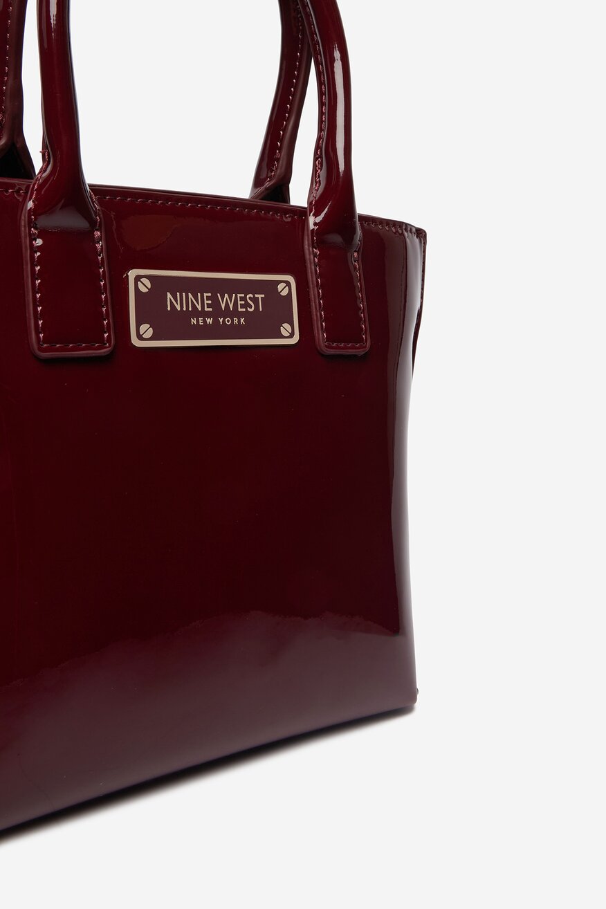
                Сумка З Ремінцем NINE WEST СВІТЛО-БОРДОВИЙ - 5907964114505